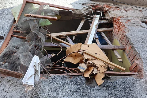 Outisde view of a home damaged by Pakistani shelling near Christ School in Poonch on May 7, 2025.