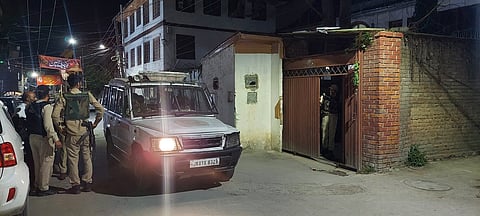 Police vehicles deployed outside the residences of elected J&K National Conference MLAs in Gupkar area of Srinagar city on the eve of July 13 Martyrs Day to prevent their movement.