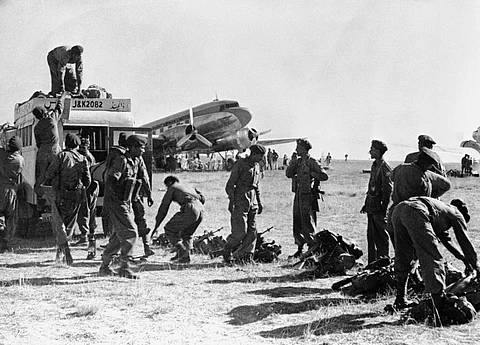 Indian soldiers landing at Srinagar airfield during the 1947–1948 war.