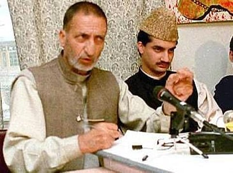 A young Mirwaiz Umar Farooq with Prof Abdul Ghani Bhat during a public event in mid-1990s in Kashmir.
