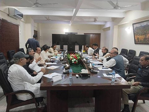 A view of the meeting between the representatives of Public Action Committee and Pakistan administered Kashmir government in Muzaffarabad.