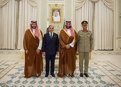In this photo released by Pakistan’s Press Information Department, Saudi Arabia’s Crown Prince Mohammed bin Salman, second right, Saudi Arabia’s Defence Minister Khalid bin Salman, left, Pakistan’s Prime Minister Shehbaz Sharif, second left, and Pakistan’s Army Chief Field Marshal Asim Munir, pose for photographs after signing a mutual defense pact, in Riyadh, Saudi Arabia, Wednesday, September 17, 2025.