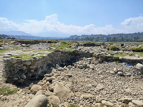 Deep Cavities left by consistent digging in the Rambiara Rivulet in Shopian district in South Kashmir which disrupt the regular water flow and threaten the nearby farmlands and orchards.
