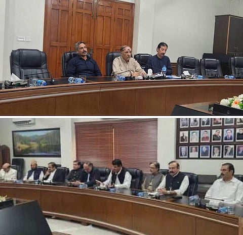 Representatives of Joint Awami Action Committee and Pakistan administered Jammu & Kashmir and Pakistan Federal government during negotiations in Muzaffarabad on Saturday, October 04, 2025.