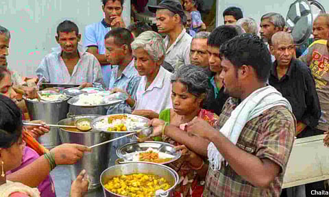 Indians distributing free food at a stall for charity in Mumbai. Image is representational.