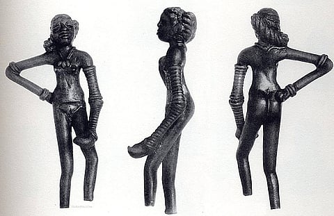 The dancing girl of Mohenjo-daro in three views, with close-ups of face, choker and bangles, and next to a dancing girl from Jaipur around 1900. John Marshall writes of this figure: "the arms and legs . . . are adorned with armlets, bangles, and anklets. These ornaments may sometimes have been made of metal, but in all probability the majority of them were shell. The custom of wearing so many shell bracelets as almost to conceal the whole of the forearm is very common in India at the present day."
