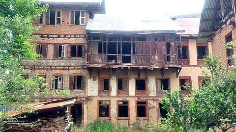 A view of the big house remaining unoccupied after the migration of Kashmiri Pandit families from different parts of Kashmir Valley since 1990.