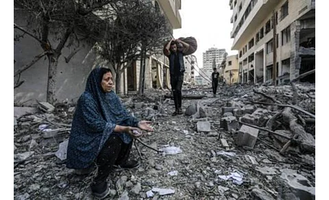 Loss and desperation: As Gaza is turned into a field of blood, gore, bodies and rubble, people go about their routine life and mourn.