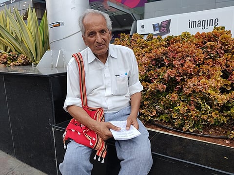Prof V.K. Tripathi who has dedicated his life to educating people through distributing pamphlets and lectures. Photo: Courtesy X