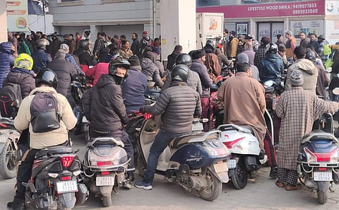 A huge rush of people trying to get petroleum products from a refilling station in Srinagar city of Kashmir on Tuesday, January 02, 2023. KT Photo/Qazi Irshad