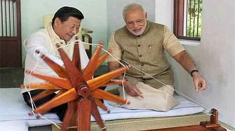 A file photo of Prime Minister Narendra Modi with Chinese President Xi Jinping in Ahmedabad during latter’s visit to India.