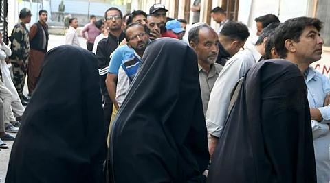 Voters waiting in long queues for casting their votes in Baramulla Parliamentary Constituency on Monday, May 20, 2024. KT Photo/Qazi Irshad