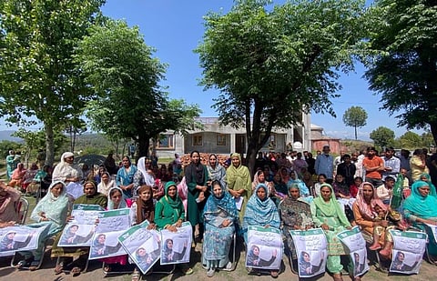 Peoples’ Democratic Party President and former chief minister Mehbooba Mufti with women supporters during an elections rally in Kashmir.