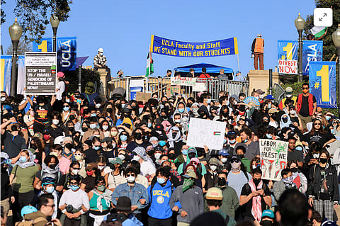 People gather at the University of California Los Angeles, as the conflict between Israel and the Palestinian Islamist group Hamas continues, in Los Angeles, California, U.S., May 1, 2024. REUTERS/David Swanson/File Photo