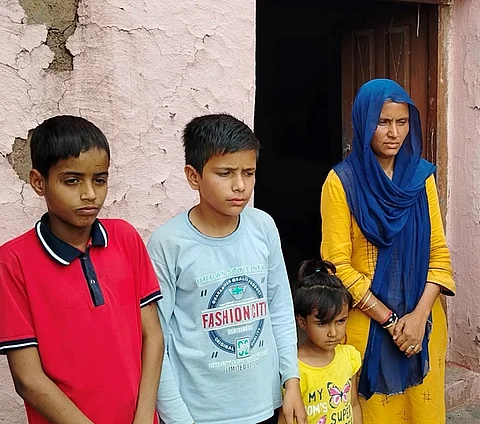 Kamal Kumar’s wife with her three children. Kamal was allegedly killed by the army sentry at Phaliana’s TCP Gate in Rajouri district of Jammu and Kashmir on December 16, 2022. All Photos/Aman Zutshi