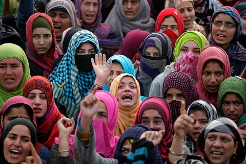 Kashmiri women protesting against Konan-Poshpora mass rapes. Photo/Danish Ismail-Reuters