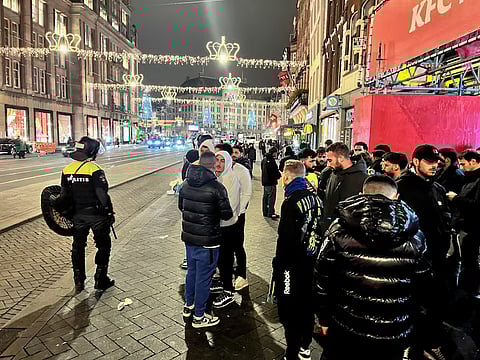 Israeli Maccabi Tel Aviv supporters are guarded by police after violence targeting Israeli football fans broke out in Amsterdam overnight, in Amsterdam, Netherlands, November 8, 2024. REUTERS/Ami Shooman/Israel Hayom
