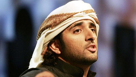 4 مارس 2007: تم التقاط صورة للشيخ حمدان أثناء أمسيات الشعر في قاعة راشيز، مركز دبي الدولي للمؤتمرات. (الصورة: KT File)