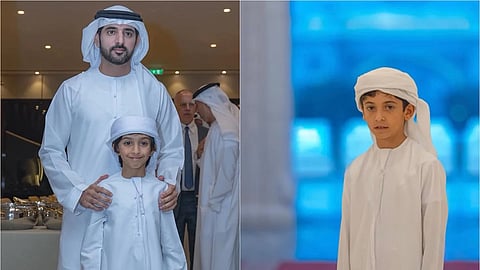 حمدان بن محمد خلال تكريمه الطفل راشد الكتبي