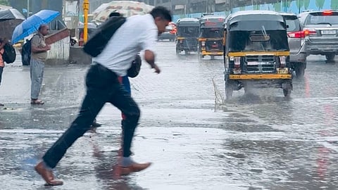 Rainfall in Mumbai brings relief from heat, traffic gridlock; heavy showers expected on Sunday!