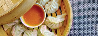 Craving momos in Ahmedabad? Check out THESE 6 local favourite spots you can't miss!