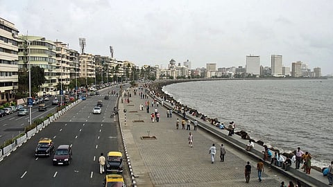 Mumbai wakes up to hazy skies as AQI slips to moderate; IMD predicts light rainfall