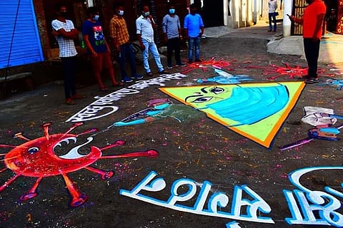 Students from LU's Arts College, paint roads with a message for Lucknow: 'Stay Home'