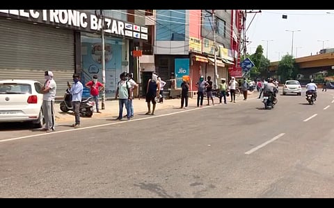 Amid calls for social distancing, long queues witnessed outside Liquor shops in Lucknow