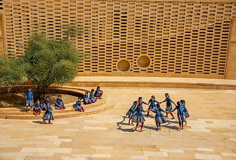 Female symbolism surrounds the sustainable architecture of THIS famous school in Jaisalmer!