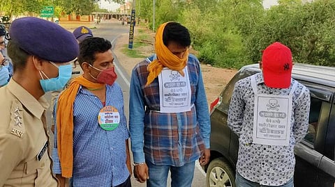 Madhya Pradesh cops support the vaccination campaign with badges for inoculated persons