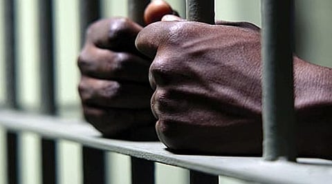 Man Behind Bars