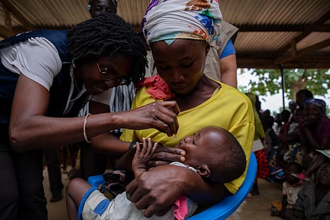Children being immunized