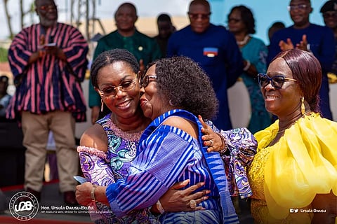 Ursula Owusu hugging her mum at the inauguration of the new library and tech facility
