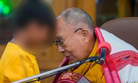 Dalai Lama and kid