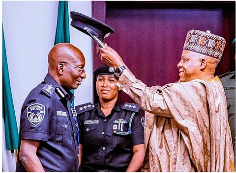 Vice President Kashim Shettima Decorating the Acting Inspector General of Police, Kayode Egbetokun