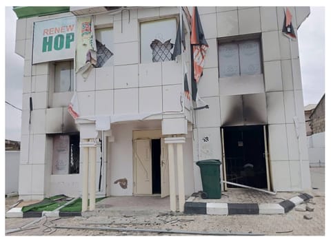 Photo of the campaign building set ablaze