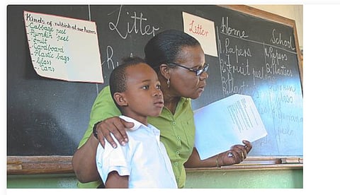 Photo of a teacher and student used to backup the story
