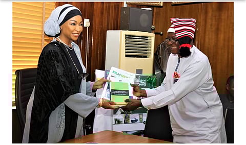 Managing Director of NFC, Dr Chidia Maduekwe, while presenting a catalog of film festivals to the Minister of Arts, Culture and Creative Economy, Ms Hannatu Musawa in Abuja.
