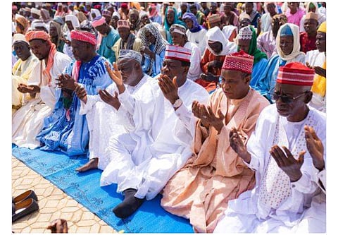 A Cross Section of the Muslim Faithful Praying