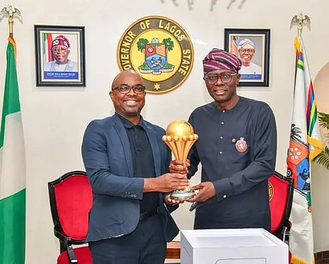Sanwo-olu receiving the AFCON trophy
