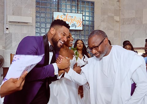 Femi Otedola while congratulating his Niece and husband on their wedding day
