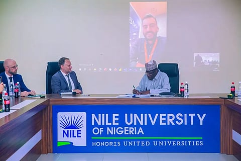 Mr. Sebastian Bede, Mr. Judikael Regnaut, and Prof. Dilli Dogo, during the signing of the MoU between Nile University and the Embassy of France in Nigeria.
