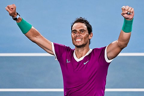 MELBOURNE, AUSTRALIA - JANUARY 28: Rafa Nadal of Spain celebrates his victory over Matteo Berrettini of Italy during day 12 of the 2022 Australian Open at Melbourne Park on January 28, 2022 in Melbourne, Australia. (Photo by TPN/Getty Images)