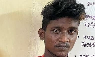 கைது செய்யப்பட்ட அமீது அப்துல் காதர்.