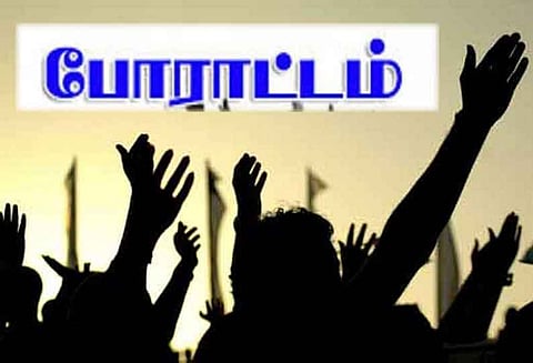 ஊட்டியில் நடைபாதை வியாபாரிகள் கொட்டும் மழையில் போராட்டம்