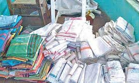 வேட்டி சேலை வழங்கும் திட்டம் தொடர்ந்து செயல்படுத்தப்படும்- அமைச்சர் ஆர்.காந்தி உறுதி