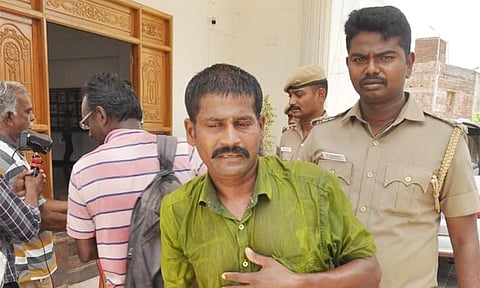 தீக்குளிக்க முயன்ற விவசாயி முனிராஜ்.