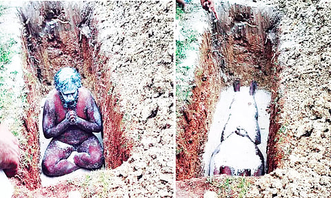 சவக்குழியில் மனைவி பிணத்தின் மீது அமர்ந்து வாலிபர் பூஜை செய்த காட்சி.