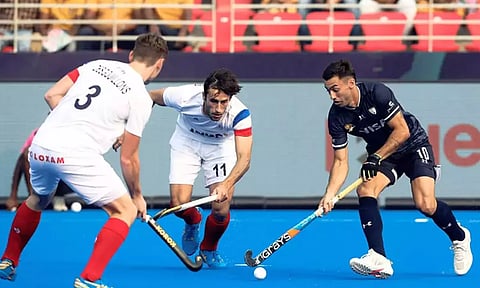 உலககோப்பை ஹாக்கி போட்டி: அர்ஜென்டினா-பிரான்ஸ் அணிகளுக்கு இடையேயான ஆட்டம் டிராவில் முடிந்தது