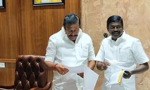 அமைச்சர் நேருவிடம், சிவபத்மநாதன் மனு அளித்தபோது எடுத்தபடம்.